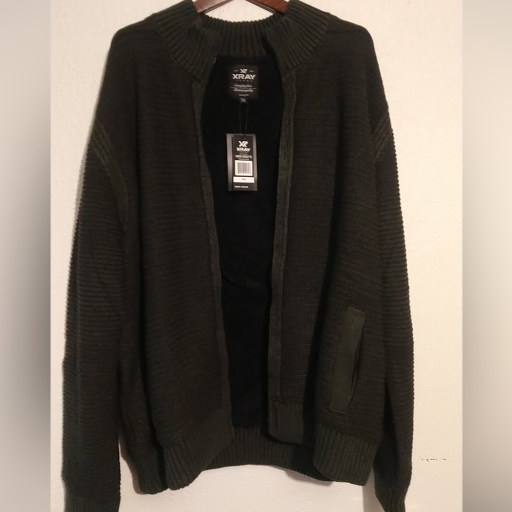 XRay sweater. New with tags. Never worn. Runs Small . It’s more like a 3XL